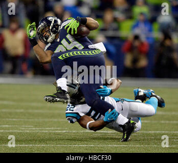 Seattle Seahawks running back Thomas Rawls (34) hurdles Carolina