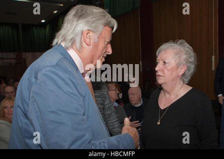 Belfast, UK. 6th December 2016. Barrister Michael Mansfield QC speaks with Marie Irvine who lost her mother in the 1971 McGurk's Bar bombing Credit:  Bonzo/Alamy Live News Stock Photo