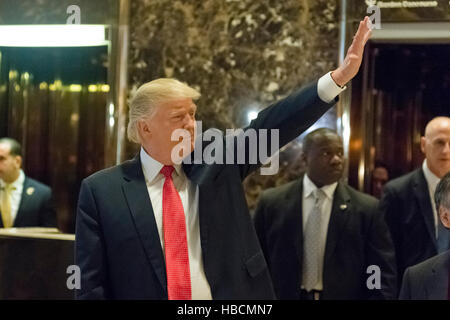 New York, USA. 6th December, 2016.  President-elect Donald Trump greets appears in Trump Tower lobby follwing his meeting with Son Masayoshi, CEO and founder of SoftBank, in New York, NY, USA. Credit:  MediaPunch Inc/Alamy Live News Stock Photo