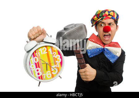 Funny clown with hammer and clock on white Stock Photo