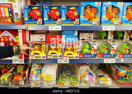 Toys from different brands in a toy store. Stock Photo