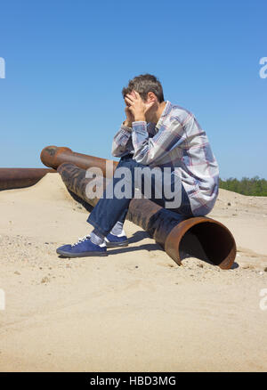 Lonely young man, suffering from depression Stock Photo
