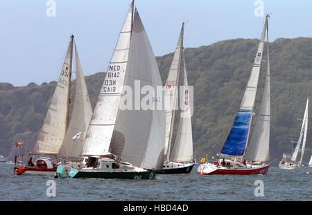 AJAXNETPHOTO. 29TH MAY, 2005. PLYMOUTH, ENGLAND. - FARADAY MILL OSTAR 2005 RACE - MONOHULLS STARTING THE 2005 RACE OFF PLYMOUTH TODAY PHOTO:TONY CARNEY/ACME/AJAX REF:OSTAR05 Stock Photo