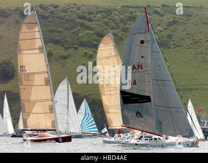 AJAXNETPHOTO. 29TH MAY, 2005. PLYMOUTH, ENGLAND. - FARADAY MILL OSTAR 2005 RACE - MONOHULLS STARTING THE 2005 RACE OFF PLYMOUTH TODAY PHOTO:TONY CARNEY/ACME/AJAX REF: OSTAR06 Stock Photo