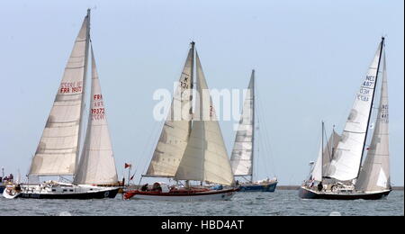 AJAXNETPHOTO. 29TH MAY, 2005. PLYMOUTH, ENGLAND. - FARADAY MILL OSTAR 2005 RACE - MONOHULLS STARTING THE 2005 RACE OFF PLYMOUTH TODAY PHOTO:TONY CARNEY/ACME/AJAX REF:OSTAR07 Stock Photo