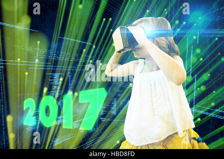 Composite image of girl wearing virtual reality simulator Stock Photo