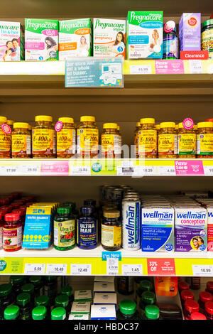 shop products product display pharmacy display shelves health food shop store UK, England, GB, Stock Photo
