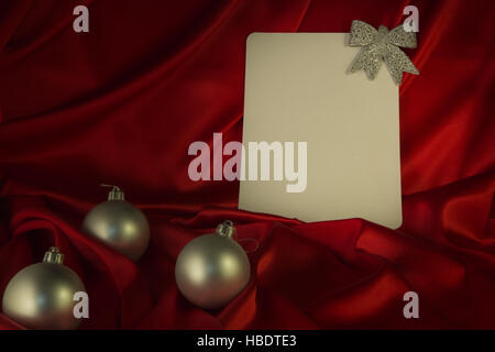 fiery-red background for congratulations on Christmas and New Year with different toys Stock Photo