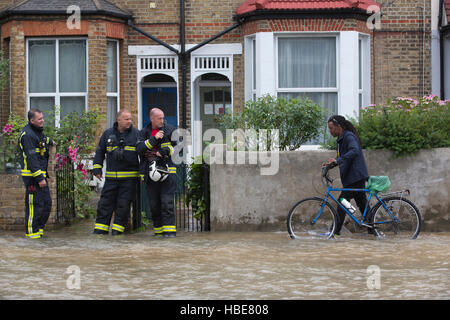 Broken water main pipe causes widespread floods in South Wimbledon, London, England, United Kingdom Stock Photo