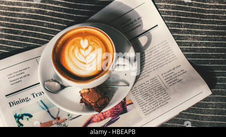 Coffee Americano Espresso Newspaper Couch Concept Stock Photo