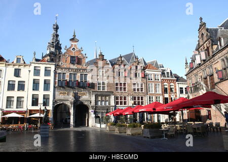 Old houses and historic façades at Grote Markt square, centre of Nijmegen, Netherlands. Grote or Stevenskerk in background. Stock Photo