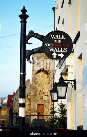 'Walk the Southampton walls' sign near Westgate in the Old Town of Southampton, Hampshire, UK Stock Photo