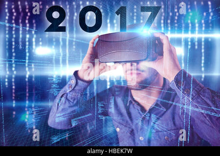 Composite image of man using an oculus Stock Photo