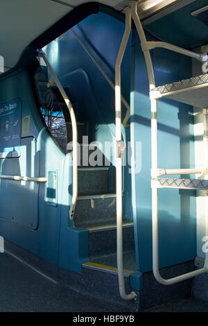 front interior staircase of modern arriva double decker bus in the uk Stock Photo