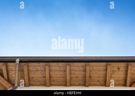 Gutter on the roof top of house Stock Photo