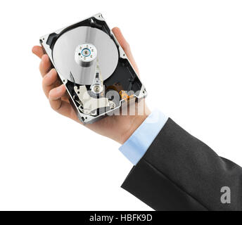 Hand and computer hard drive Stock Photo
