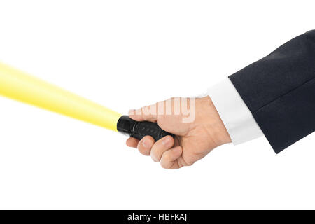 Flashlight in hand Stock Photo