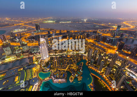 View from Burj Khalifa observation deck, Dubai Fountain, The Address Downtown Burj, Dubai Mall and Souk Al Bahar, evening Stock Photo