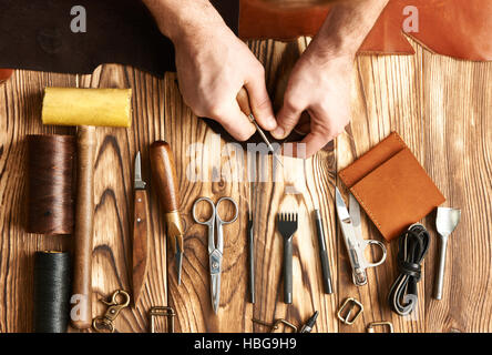 Man working with leather Stock Photo