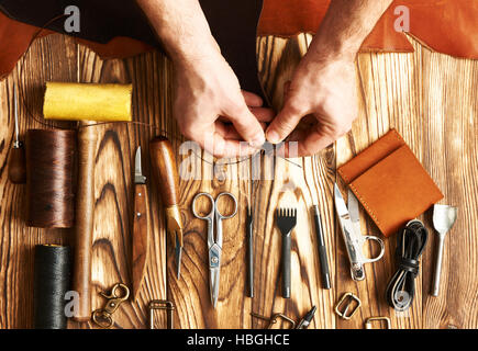 Man working with leather Stock Photo