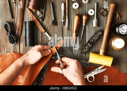 Man working with leather Stock Photo