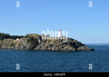 Swallowtail Lighthouse, Grand Manan Island, seen from a ferry boat. Stock Photo