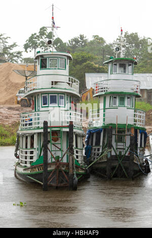 Small harbor and public boats on the Amazon River in Brazil Stock Photo