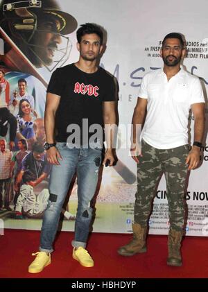 Sushant Singh Rajput ; Indian Bollywood actor with Indian cricket player Mahendra Singh Dhoni at promotion of film M S Dhoni in Mumbai India Asia Stock Photo
