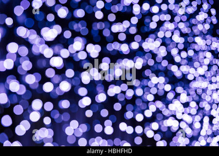 highly defocused blue lights dots on black background Stock Photo