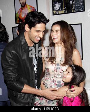 Sidharth Malhotra, India Bollywood actor with actress Alia Bhatt at calendar launch of fashion photographer Dabboo Ratnani in Mumbai India Stock Photo