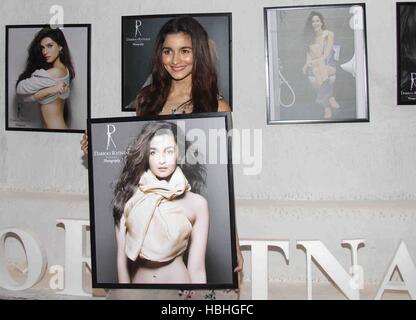 Alia Bhatt, Indian Bollywood actress with her picture frame at calendar launch of fashion photographer Dabboo Ratnani in Mumbai India Stock Photo