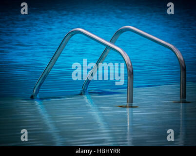 Swimming pool ladder Stock Photo