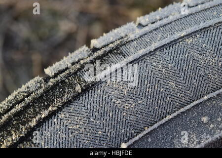 Hoarfrost on a rubber tire wheel Stock Photo