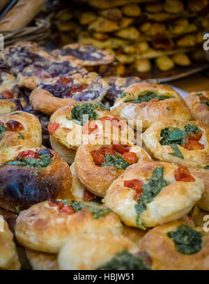 Freshly baked spinach and tomato buns Stock Photo