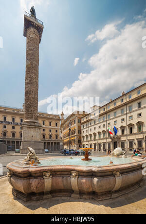 Fountain in Piazza Colonna in Rome. Italy Stock Photo