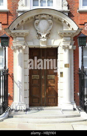 Luxury wooden door to apartment Stock Photo