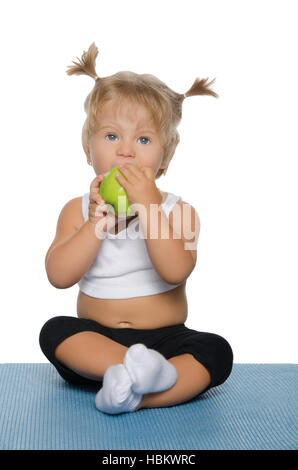 little girl with green apple Stock Photo