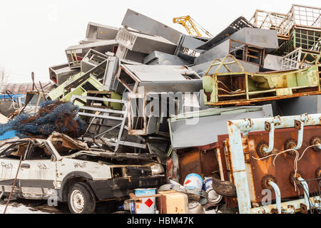 A large pile of scrap metal and rusty old car close-up. Stock Photo