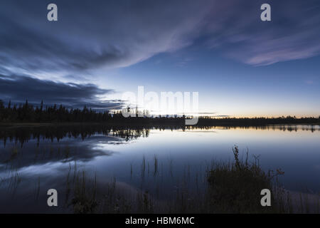 Evening mood beside a lake, Lapland, Sweden Stock Photo