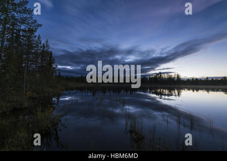 Evening mood beside a lake, Lapland, Sweden Stock Photo