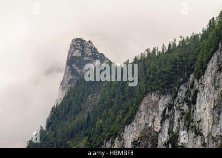 Dachstein mountains covered by fog and clouds, Salzkammergut, Austria Stock Photo