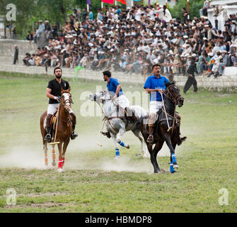 Free-style mountain polo being played on the Chitral Polo Ground. Stock Photo