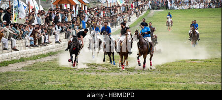 Free-style mountain polo being played on the Chitral Polo Ground. Stock Photo