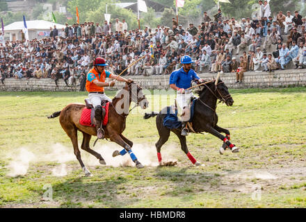 Free-style mountain polo being played on the Chitral Polo Ground. Stock Photo