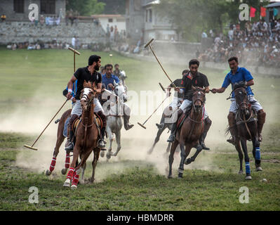 Free-style mountain polo being played on the Chitral Polo Ground. Stock Photo