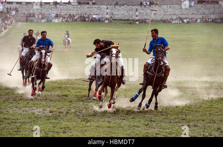 Free-style mountain polo being played on the Chitral Polo Ground. Stock Photo