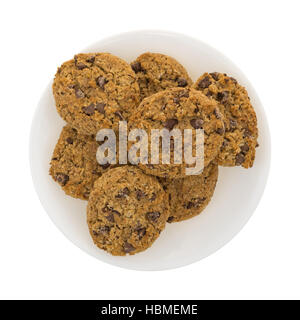 Top view of a plate of oatmeal chocolate chip cookies isolated on a white background. Stock Photo