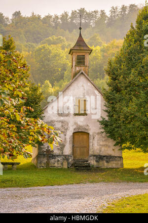 Old German church in autumnal decor Stock Photo