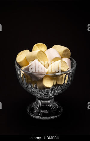 Closeup of marshmallows on the dark background Stock Photo