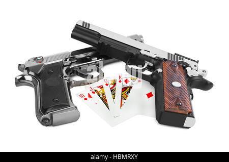 Guns and playing cards Stock Photo